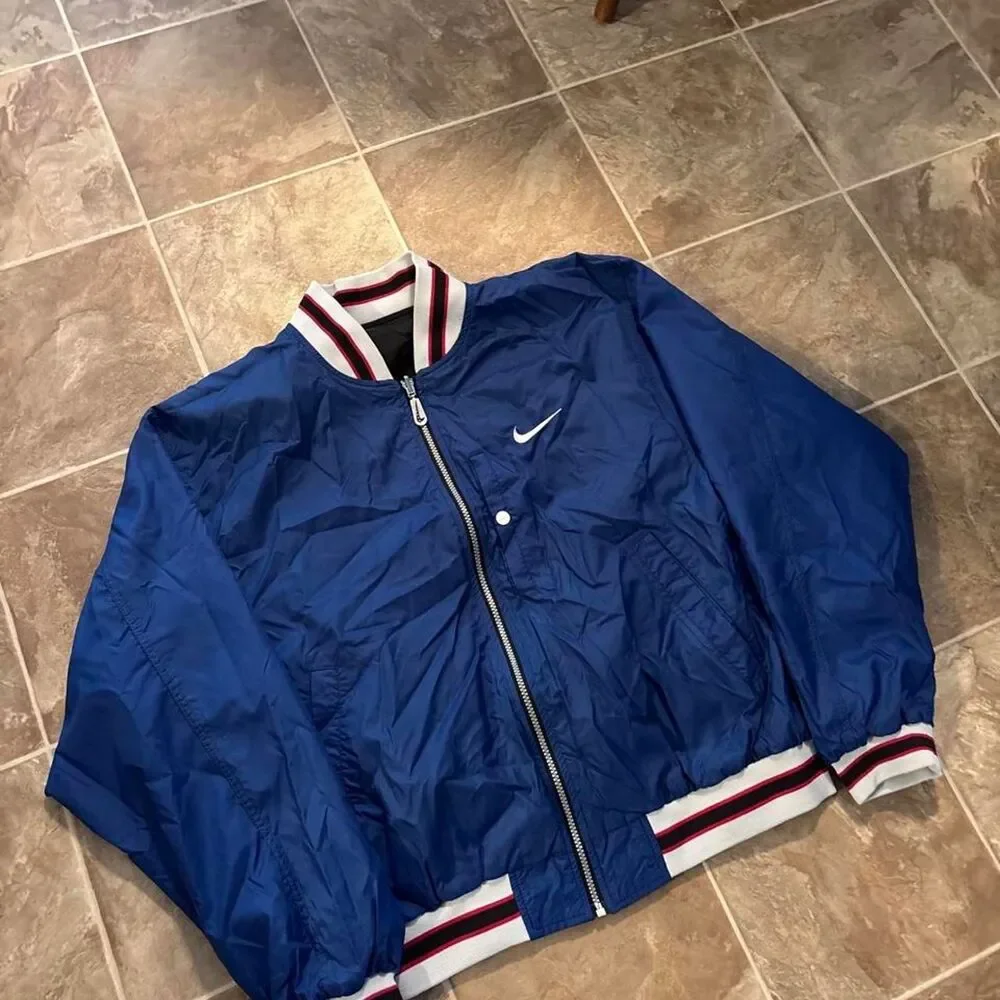 Vintage 1990s Nike blue an black reversible jacket, great shape, size M!